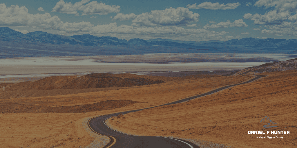 strategies for success. A road leading into a desert landscape.